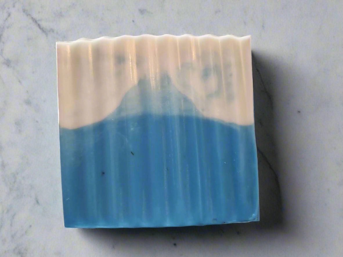 Montana Cool Mountain Musk bath bar made with goat milk soap mountain shape on bar