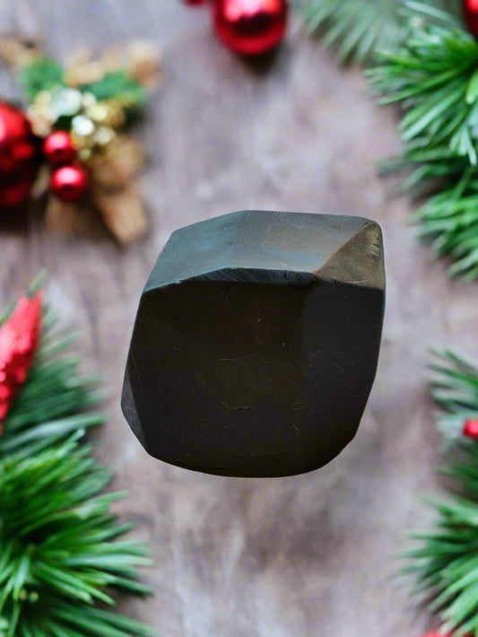 Chunk of coal hand soap made with goat milk soap